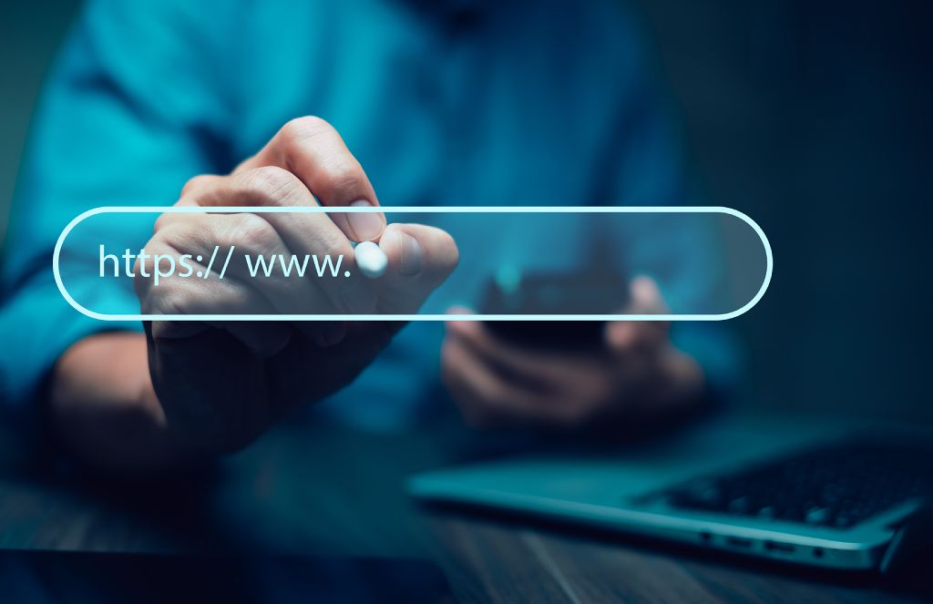 Domain hand writing website href on glass mirror with white marker